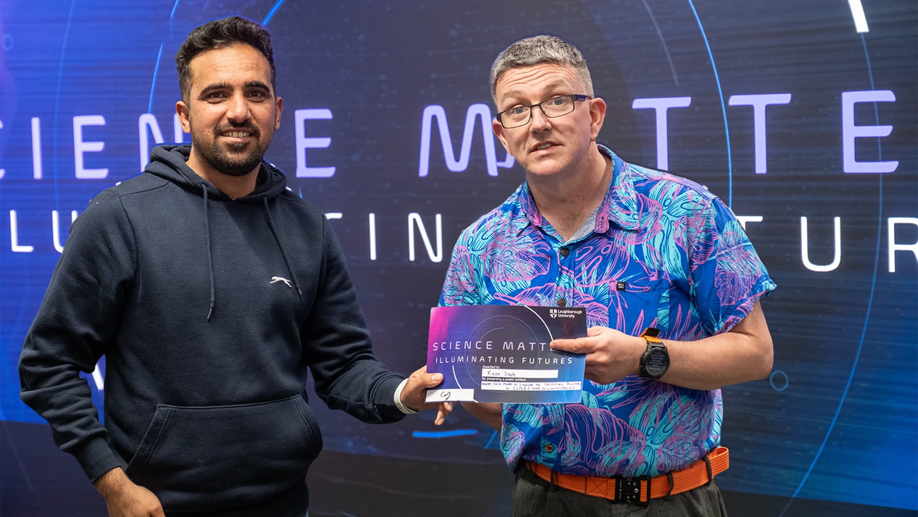 Raza being awarded a certificate